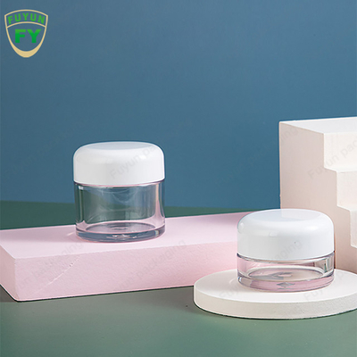 プラスチック光沢がある手の目の白い帽子30ml 50mlが付いている顔のSkincareのクリーム色の瓶